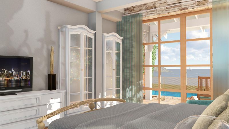 Главная спальня с панорамным окном на море